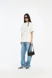 ROTATE Weißes, oversized T-Shirt mit Peplum