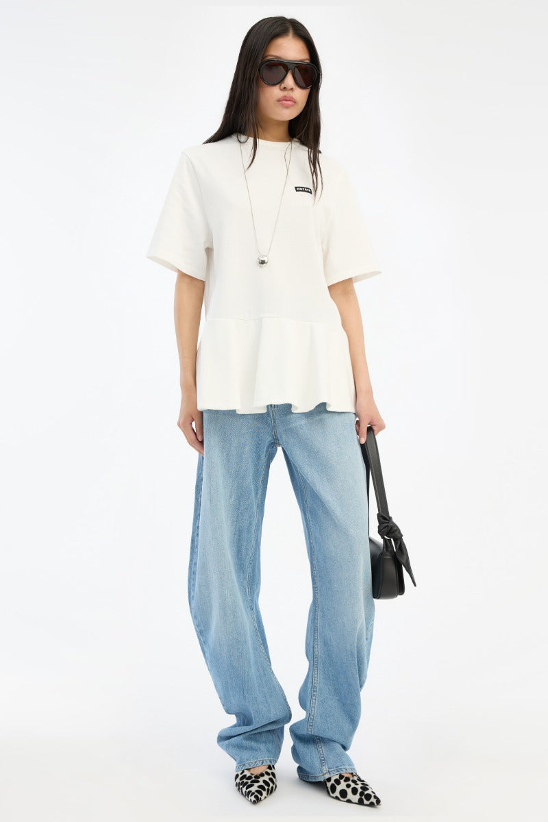 ROTATE Weißes, oversized T-Shirt mit Peplum