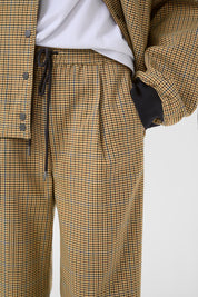 Weite, karierte Trackpants