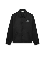 DRÔLE DE MONSIEUR Schwarzes Coachjacket mit Print