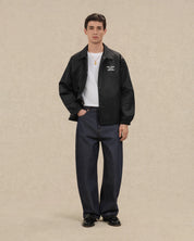 DRÔLE DE MONSIEUR Schwarzes Coachjacket mit Print