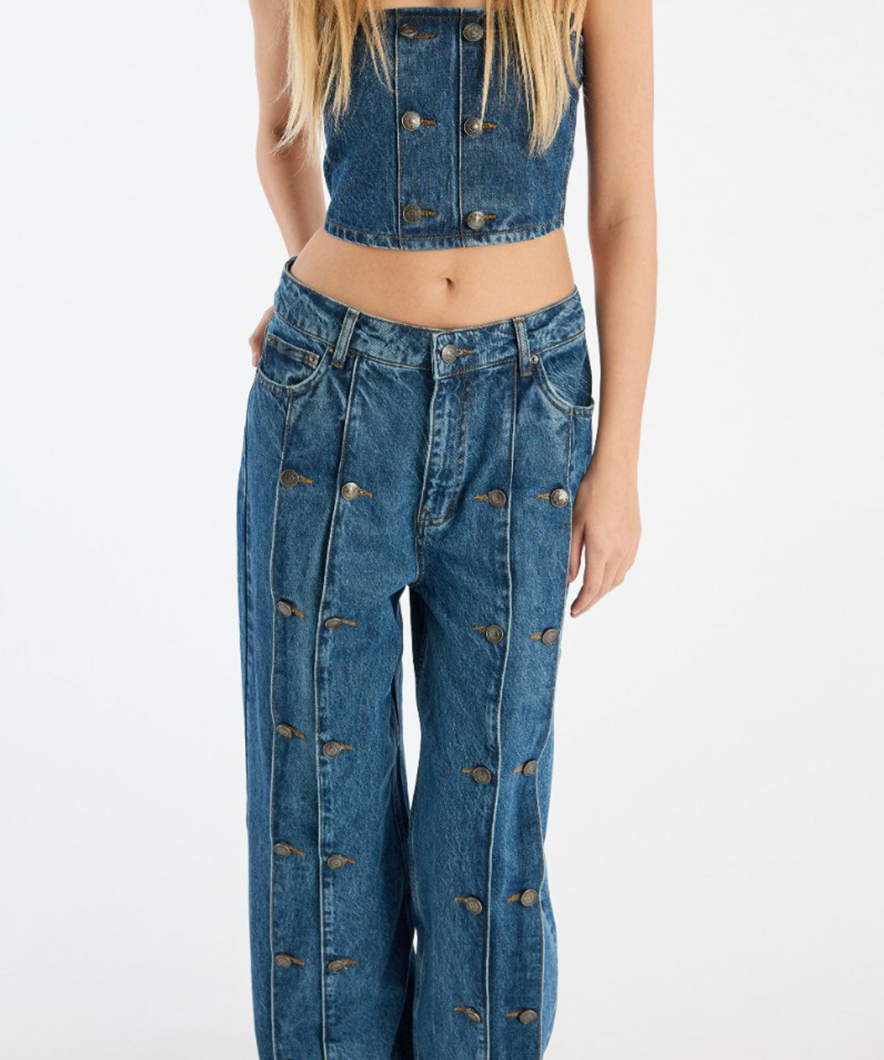 ROTATE Dunkelblaue Jeans mit Knopfdetails